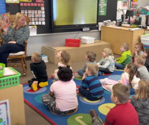 East 4K Listening to a story during class