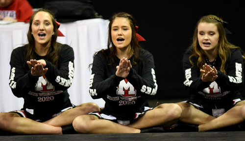 cheerleaders cheering on wrestling team cheerleaders cheering on wrestling team
