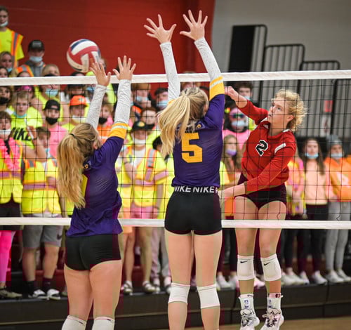 girls volleyball students going for block and spike girls volleyball students going for block and spike