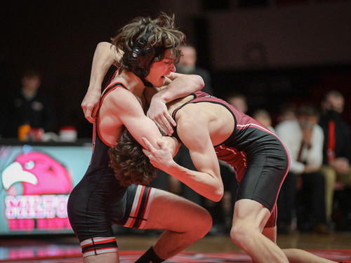 two wrestlers competing two wrestlers competing
