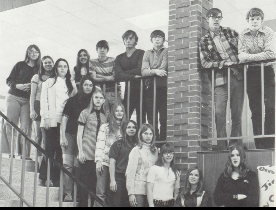 A student group photo taken during the late 1970s. Students are lined up on the stairs and balcony posing for the shot